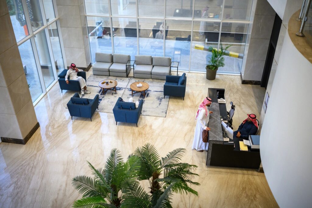 Spacious lobby with seating and reception desk.